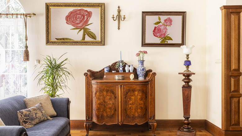 A room with preppy vintage furniture and decor