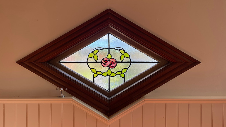 Diamond-shaped stained glass window in home