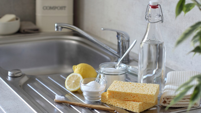 Lemon and salt near sink