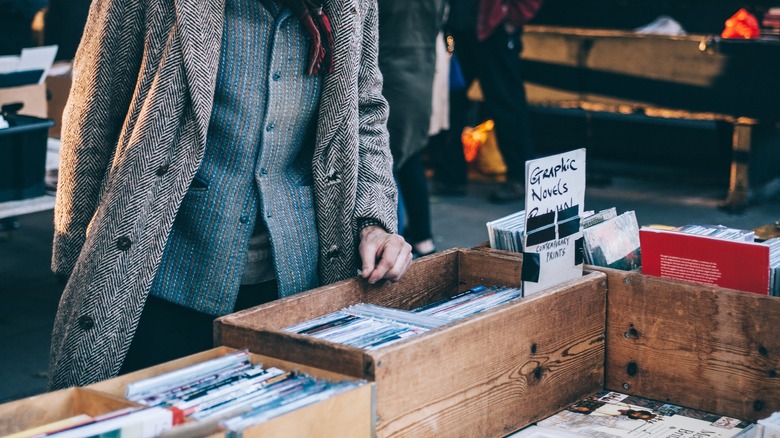 Person looking at novels