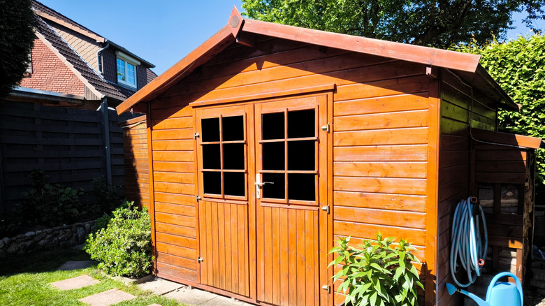 A wooden garden shed
