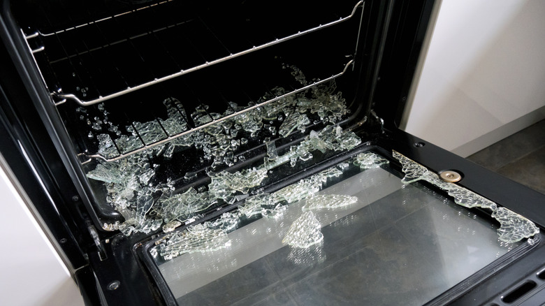 Oven opened with broken glass from a dish
