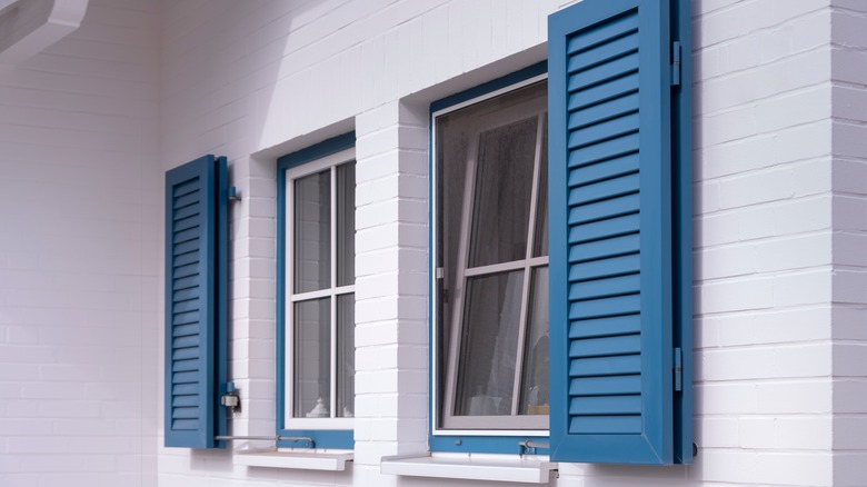 white house with blue shutters