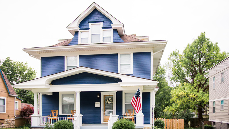 blue colonial style home 