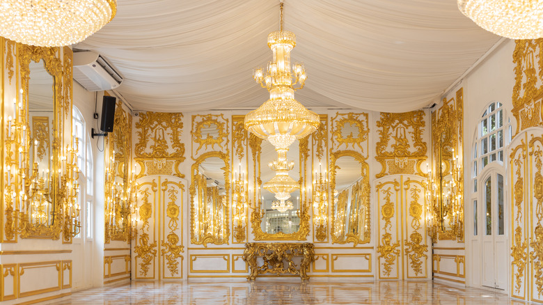 Baroque inspired living room with gold details