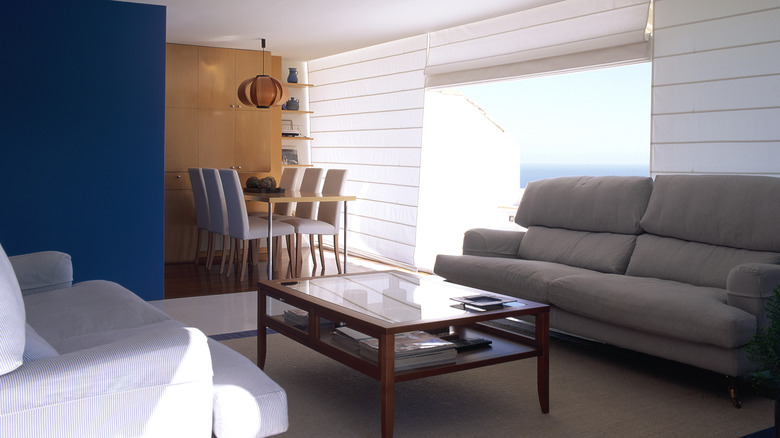eclectic room with mismatched furniture
