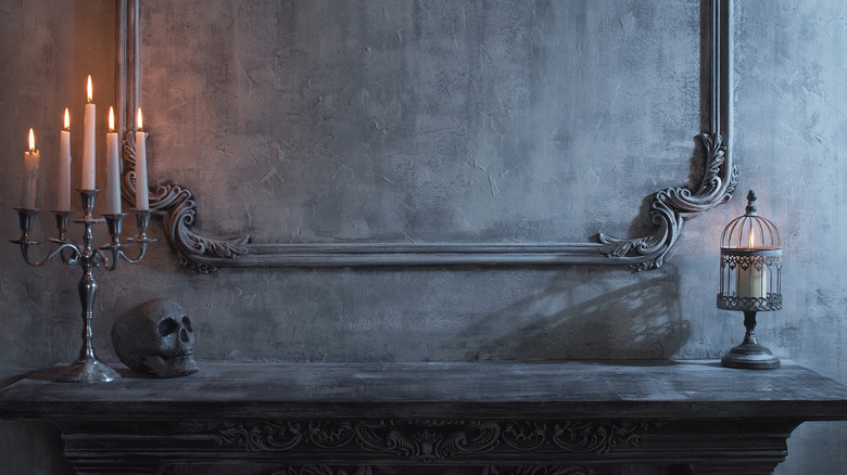 skull and candle on mantle 