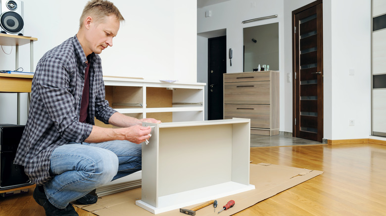 Person building a new dresser