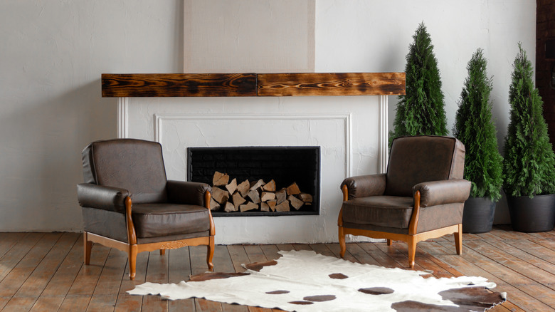 armchairs in front of fireplace