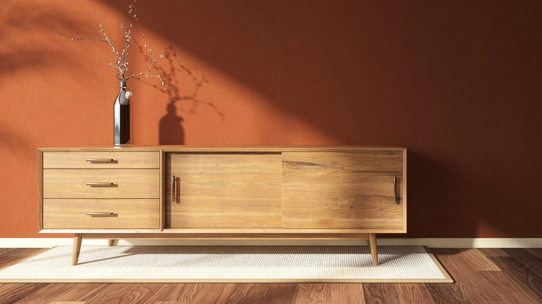 wooden credenza table with flowers