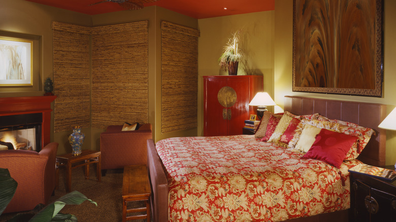 Red and yellow room with gold and wood
