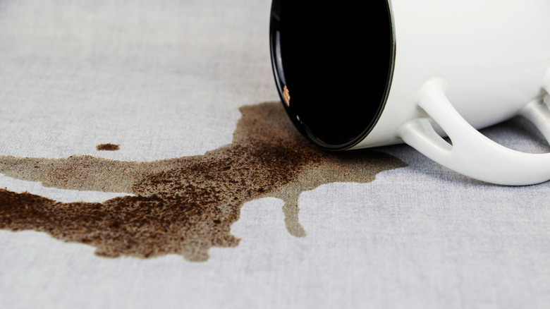 Spilled coffee on tablecloth