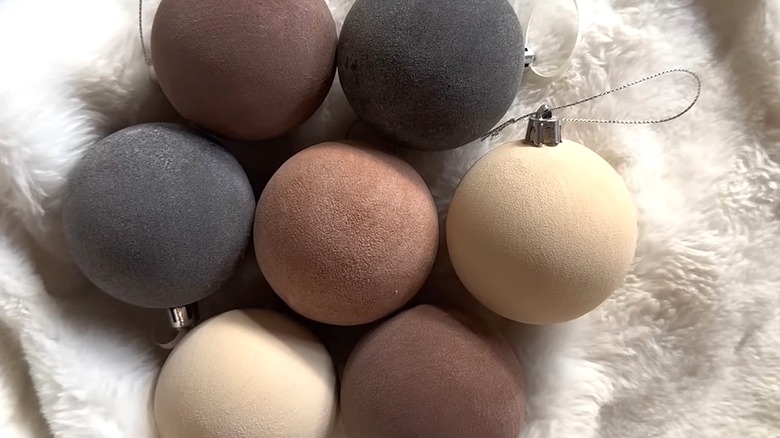 Homemade flocked Christmas ornaments.