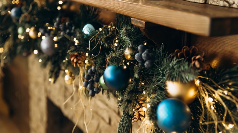 decorative garland hanging from fireplace mantel