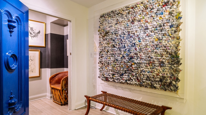 Corporate office with wall tapestry behind the front door