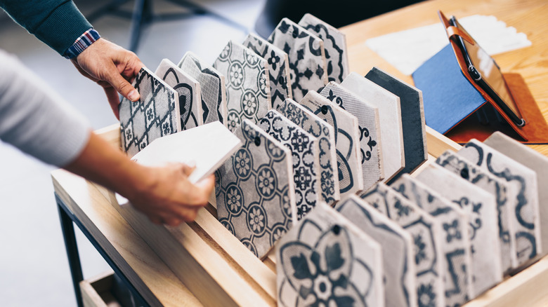 person shopping for ceramic tiles