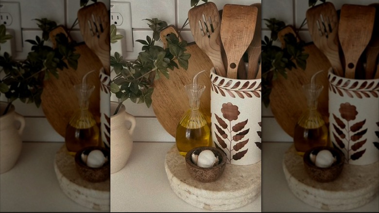 Stone bowl turned into a countertop riser with decor in kitchen