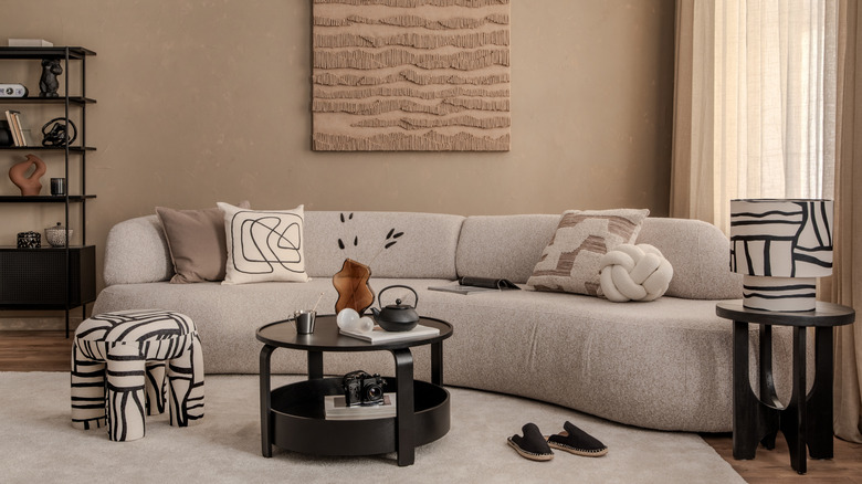 A curved sofa in a living room