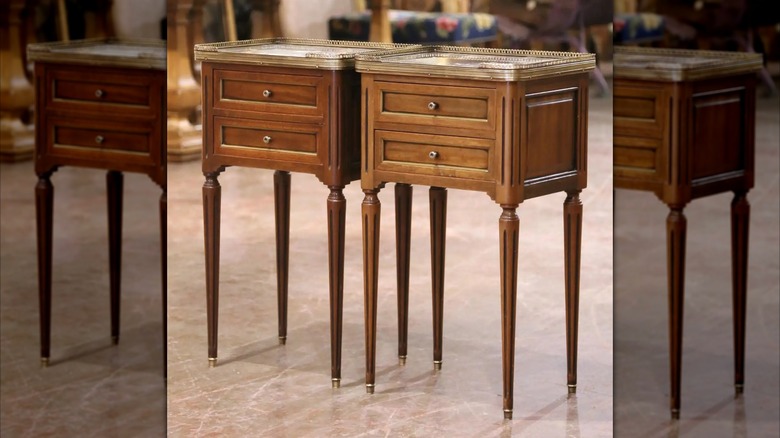 A pair of Louis XVI walnut nightstands