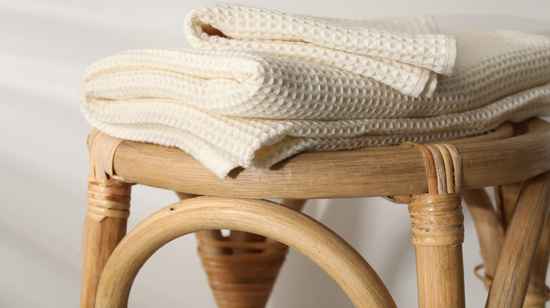 Stool with towels on it