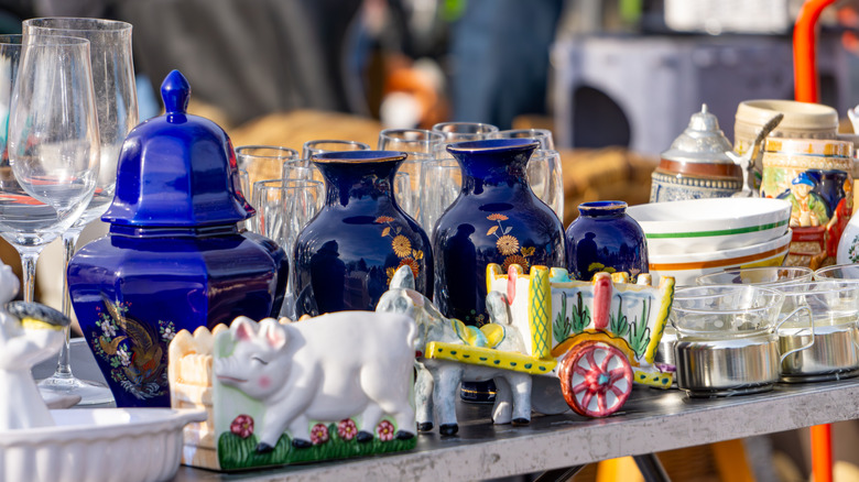 A table full of antique kitchen items and decor