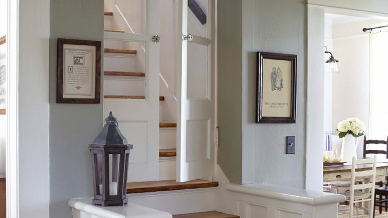 The glass doors glass doors at the bottom of the stairs inside Erin Napier's house.