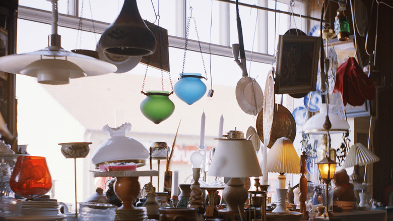 A collection of vintage lamps at a thrift store.