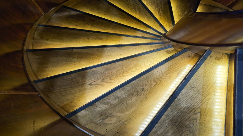 overhead shot of illuminated spiral staircase