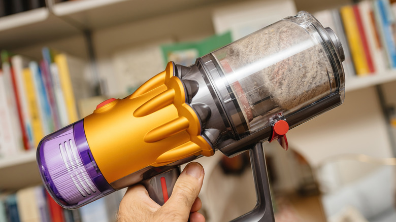 Dyson vacuum cleaner full of dirt