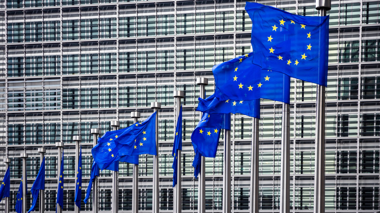 EU Flags in front skyscraper