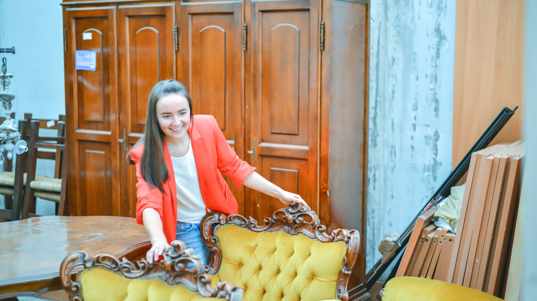 Person shopping for antique furniture