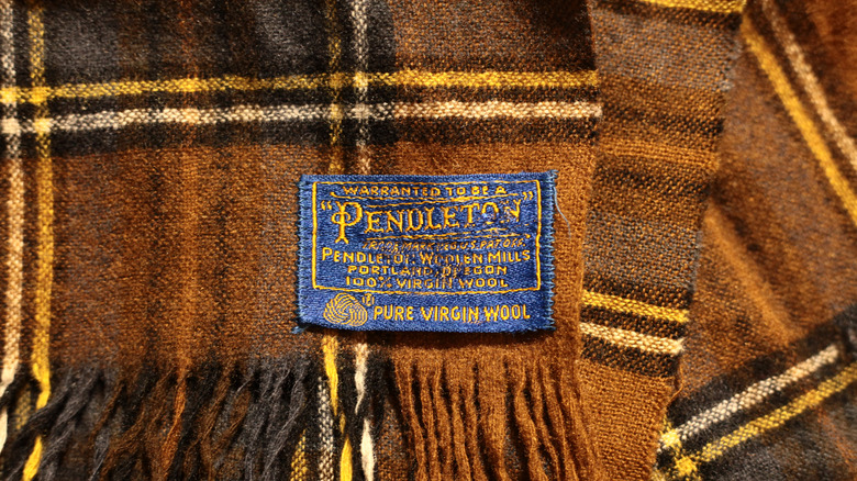 A Pendleton blanket showing a distinctive blue tag