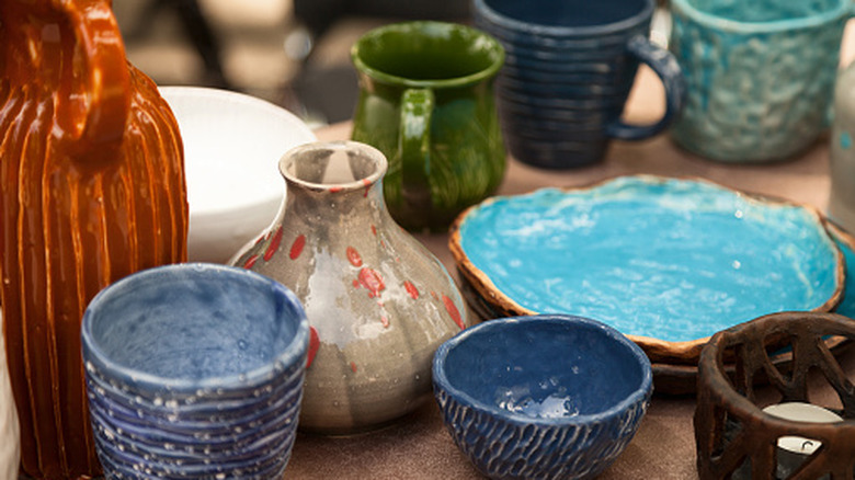 various pottery items on table