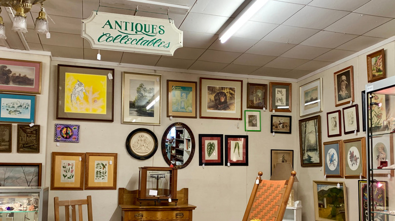 Vintage art hanging in antique store