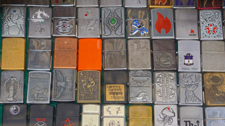 A neat display of vintage metal lighters at a thrift store.