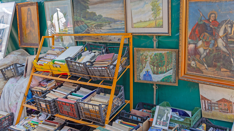 Thrift store with several pieces of artwork