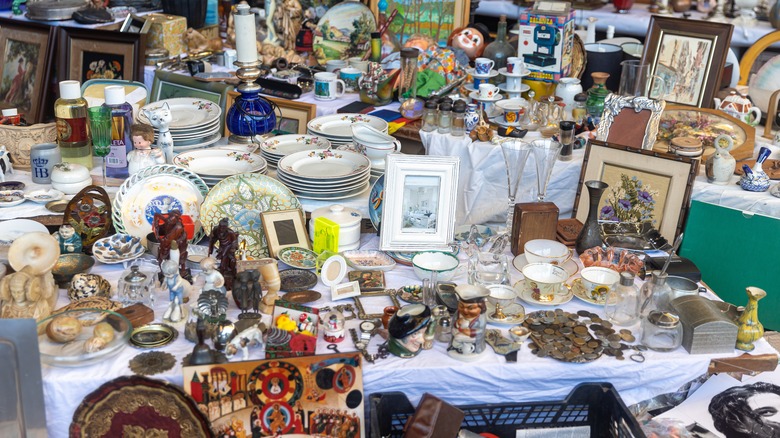 An antique store is filled with trinkets, dolls, and memorabilia