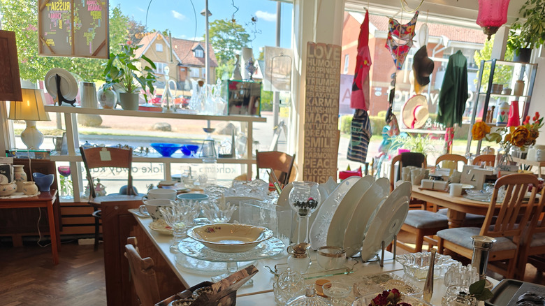 Vintage glassware and dishes at a thrift store.