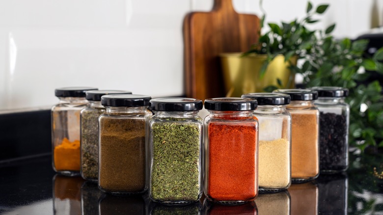 spices lined up on countertop