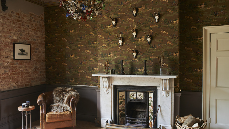 maximalist room with fireplace and chair