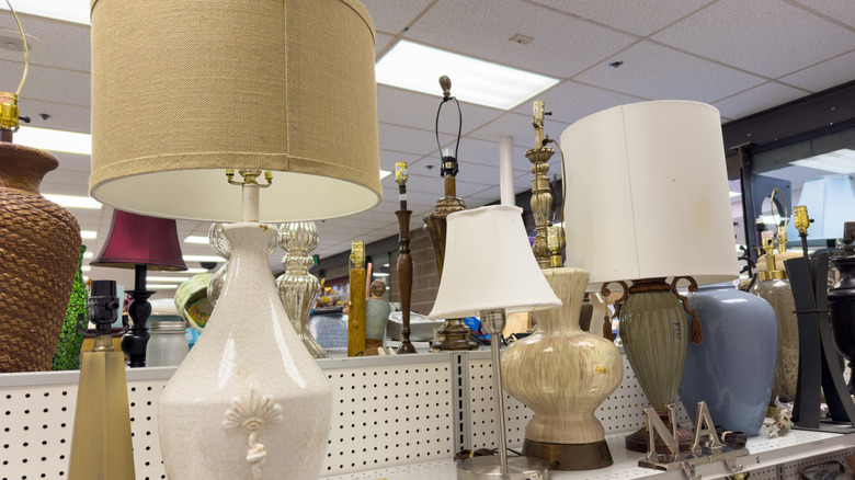 vintage lamps on thrift store shelf