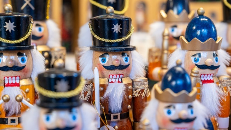 Several traditional wooden nutcrackers standing in a group
