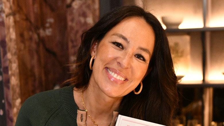 Joanna Gaines smiling at an event for her book