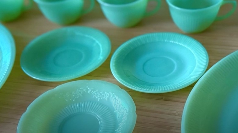 Fire King Jane Ray vintage jadeite glassware on a table