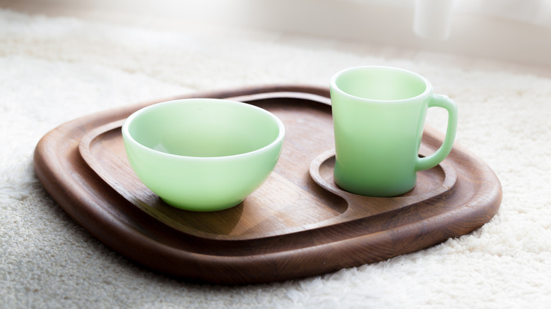 vintage Jade-ite mug and bowl on a wood tray