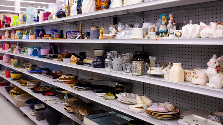Pottery on thrift store shelves