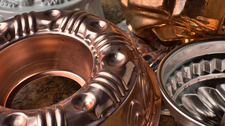 Jello molds in a pile on a counter top