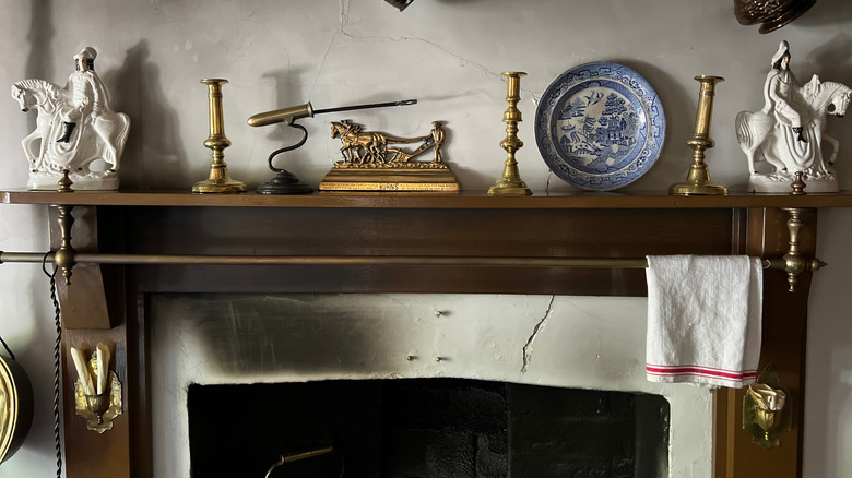 fireplace mantel with vintage decor