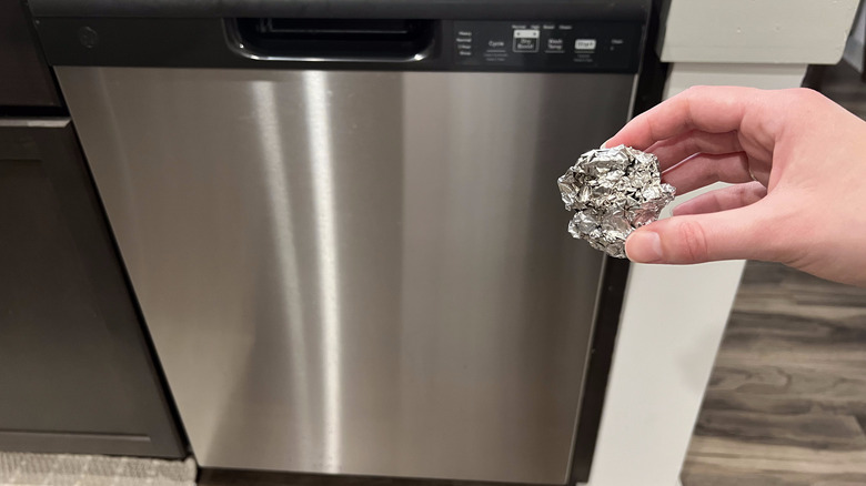 dishwasher with aluminum foil ball
