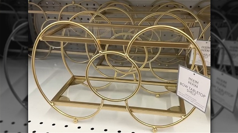 Gold bow-shaped storage shelf from Five Below